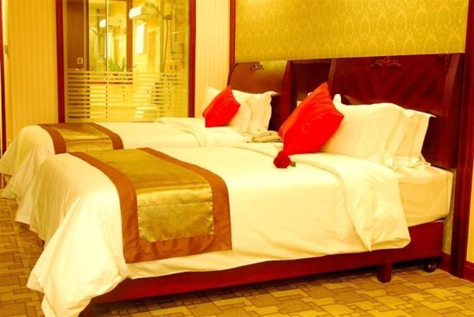 ננינג Vienna Hotel Chaoyang חדר תמונה