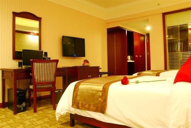 ננינג Vienna Hotel Chaoyang חדר תמונה