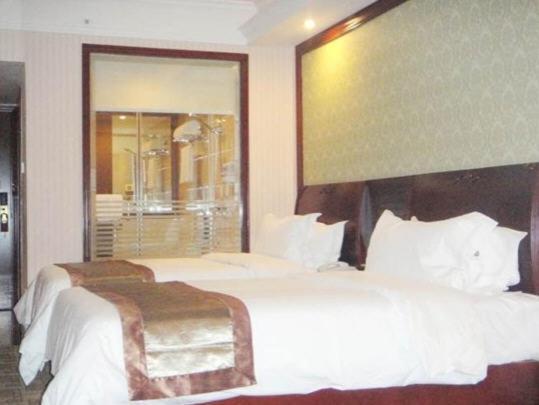 ננינג Vienna Hotel Chaoyang חדר תמונה